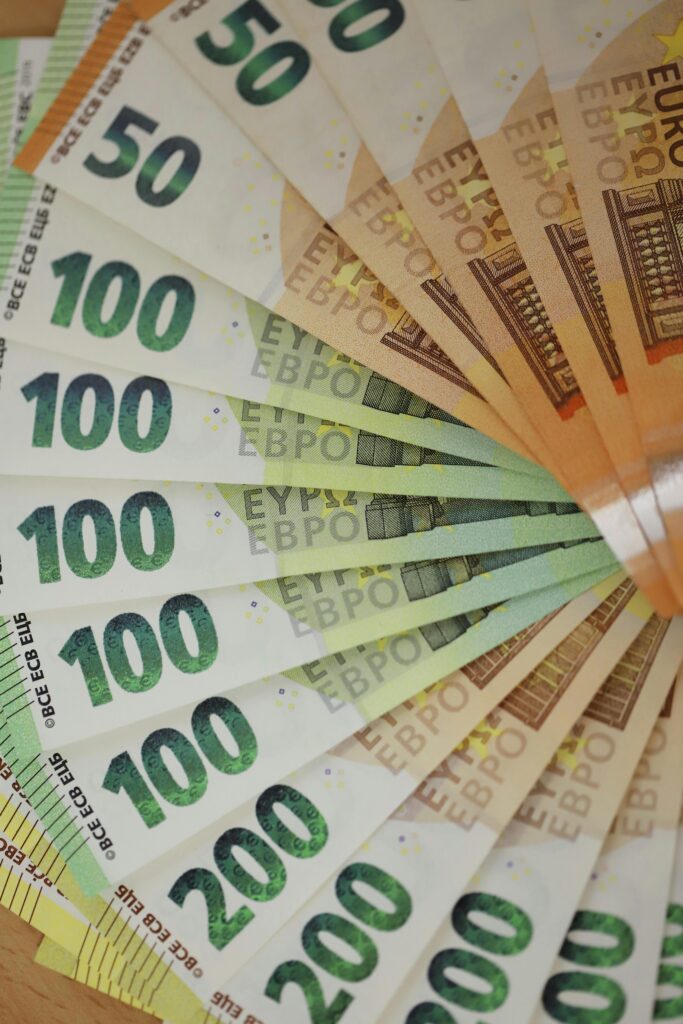 Colorful array of euro banknotes fanned out, showcasing various denominations for financial themes.
